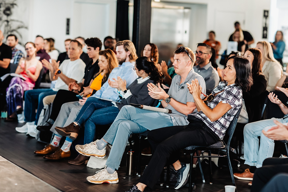 Audience applauds at a conference